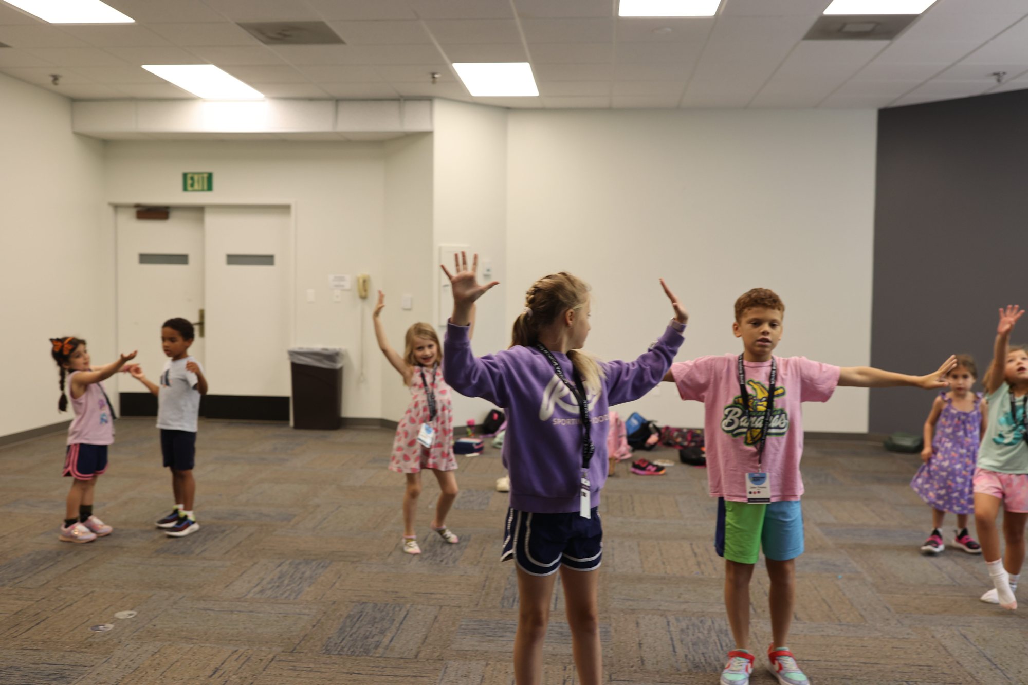 Kids rehearsing choreography