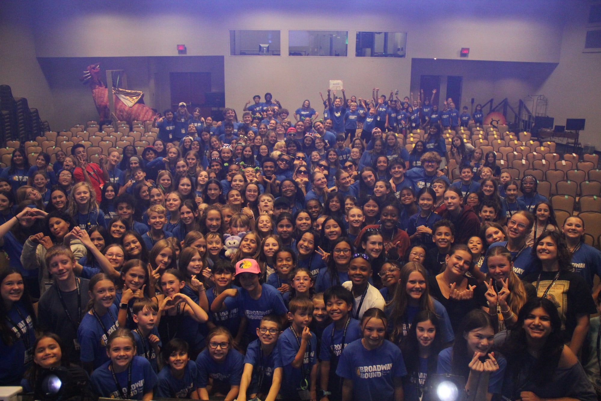 The full Broadway Bound summer theatre camp cast — more than a hundred young performers ages 5 to 15 — gathered in the theater at the National Conference Center in Leesburg, Virginia