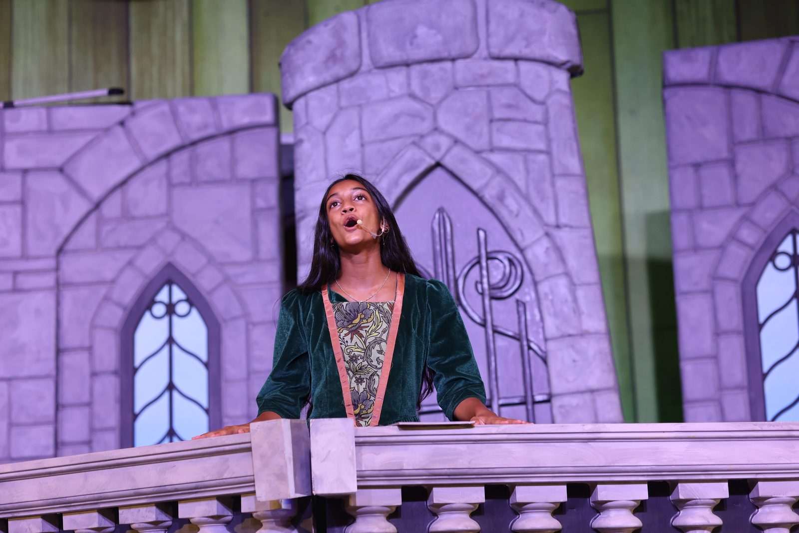 A camper singing as Princess Fiona from the tower